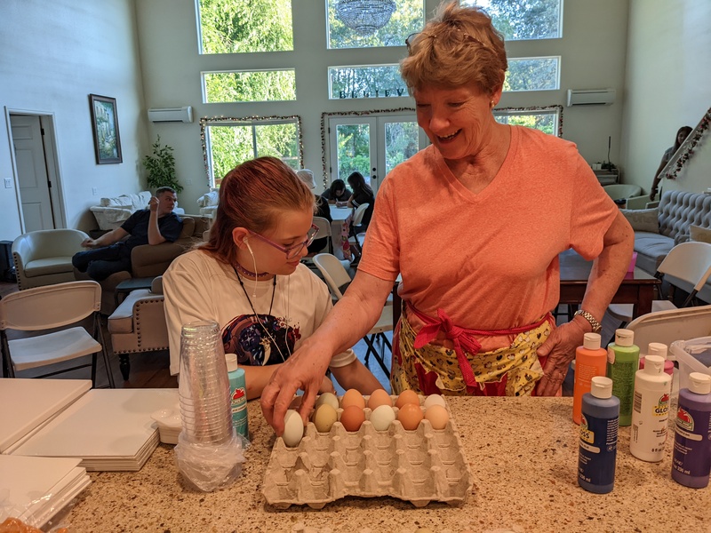 Cassie and Laura organizing the daily eggs.