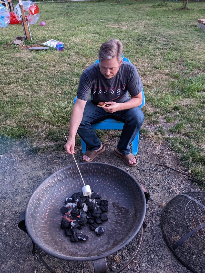 Daniel cooking a Marshmallow