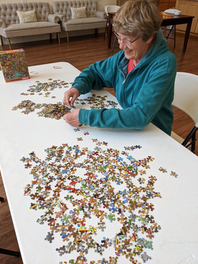 Laura and Lois starting another puzzle.