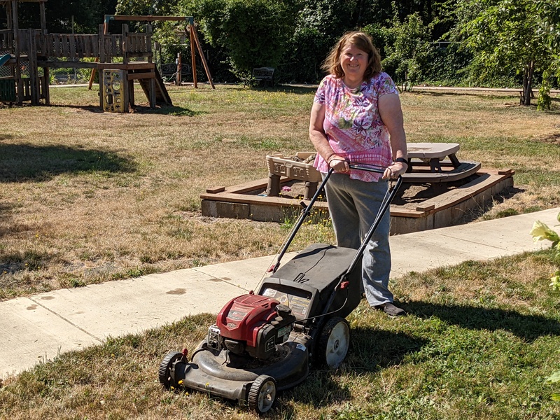 Lois mowing the Picnic Area.