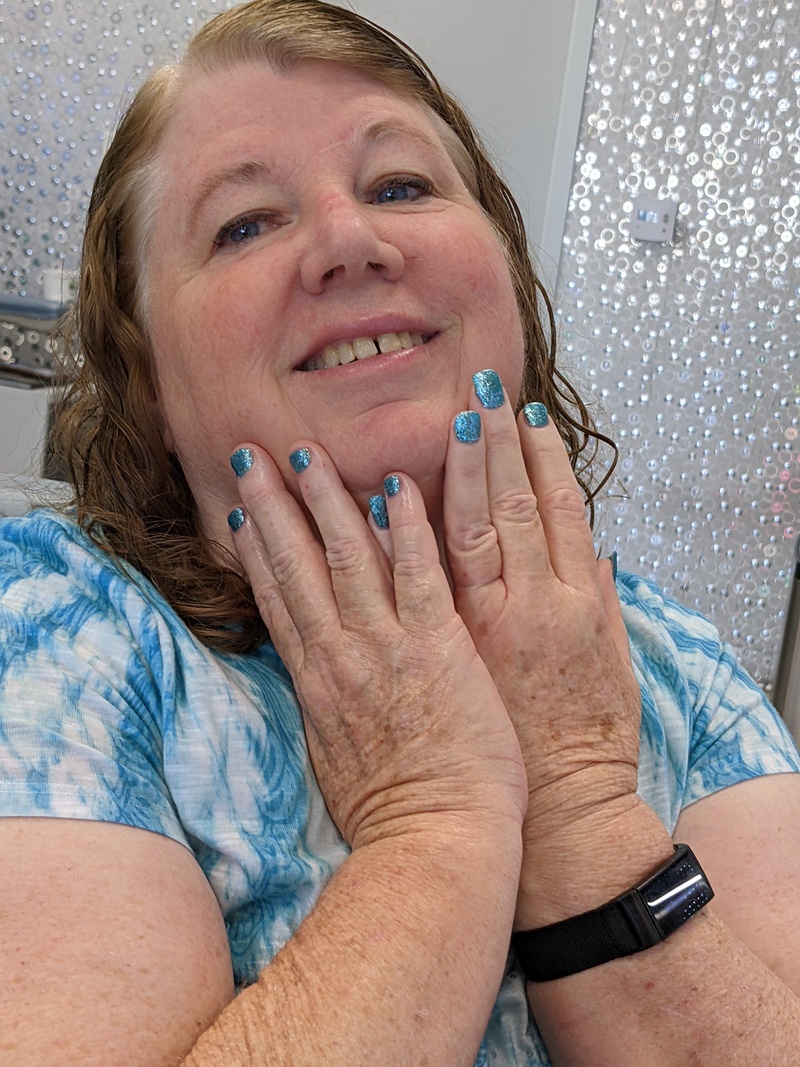 Lois got her first manicure and got her nails painted.