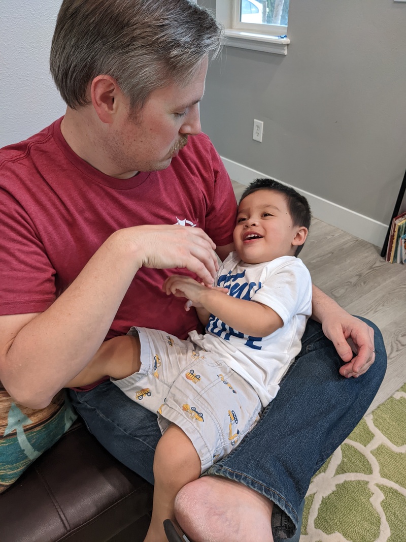 Daniel playing with the birthday boy.