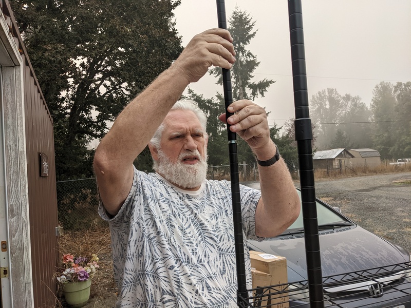 Don building a shelving unit for LoCon.