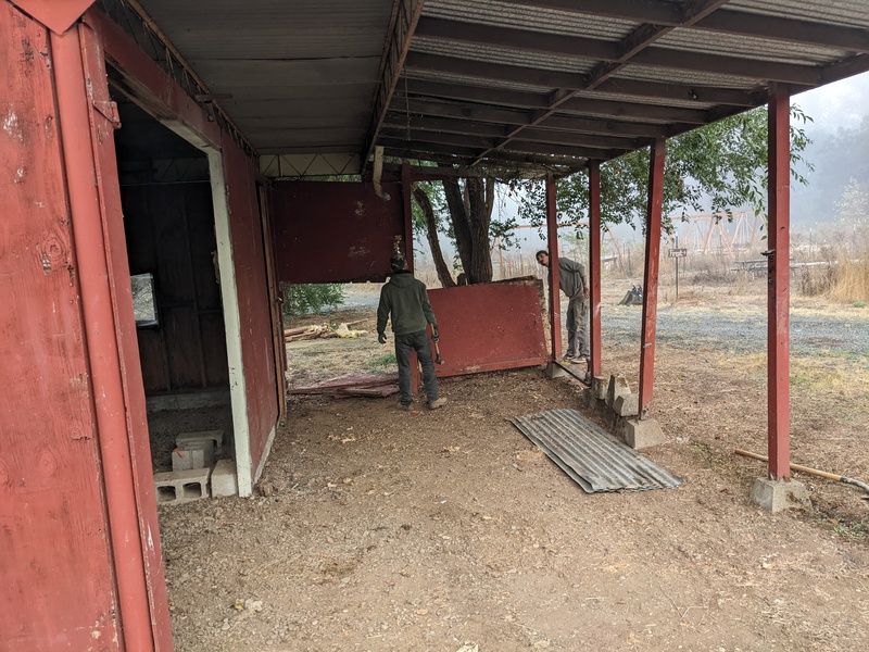 Trapezoid: removing rotted wood from the red shed.