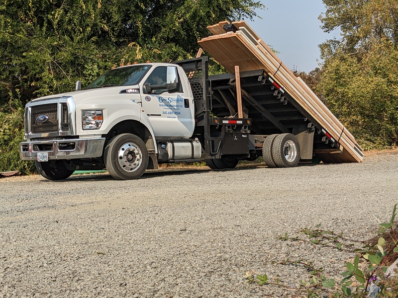 A load of wood comes.