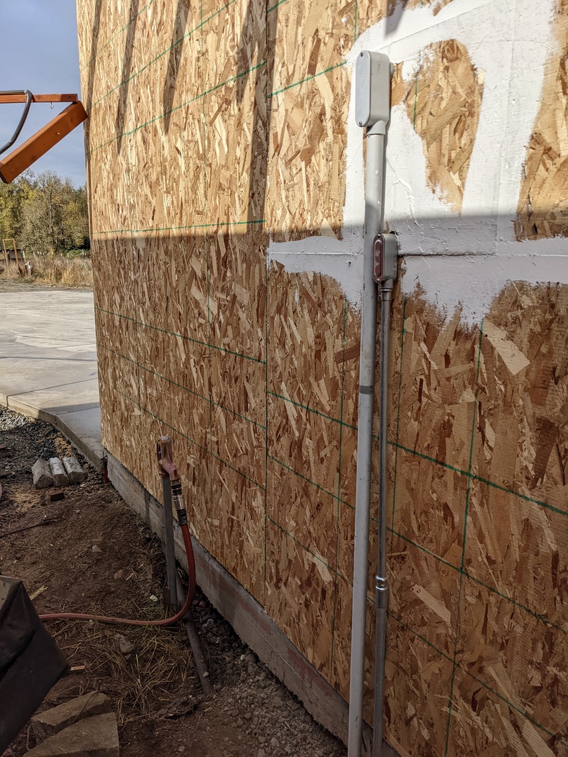 Bower South Face. Alley. Electrical panel backing.