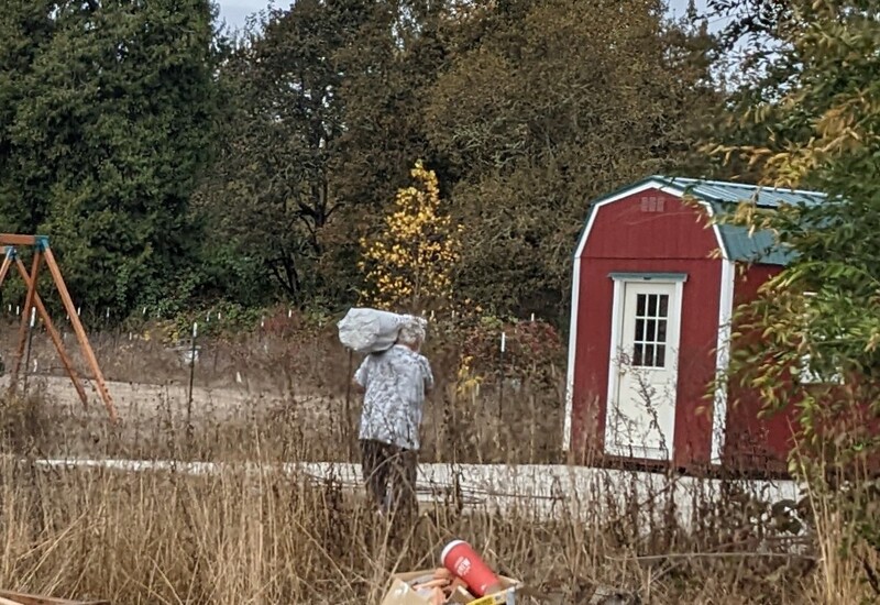 Don hauling a new mattress to the bunkhouse.