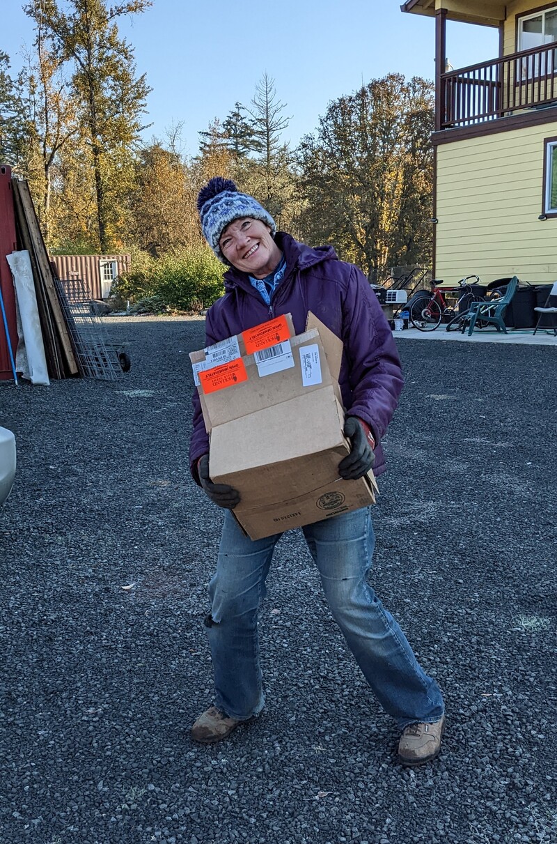 Laura hauling boxes.