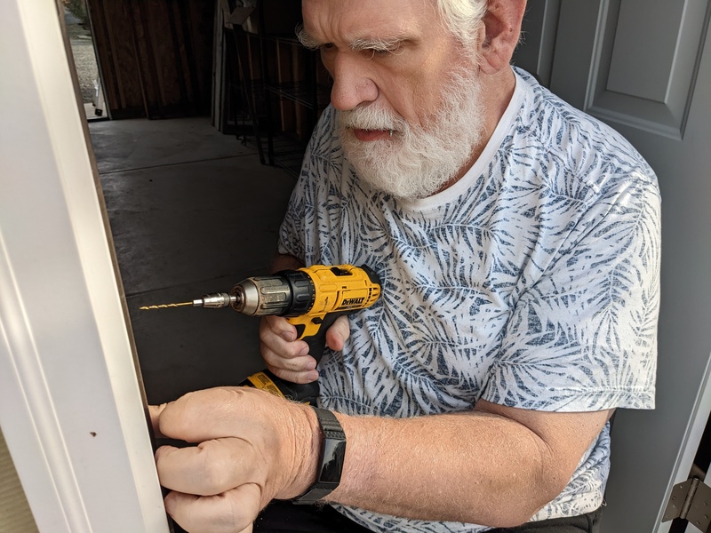 Don doing doorknob and latch of the poison room.