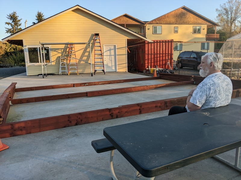 Don admiring the view of The Bower and bunkhouse B2 foundation.