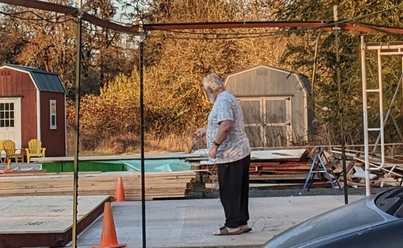 Don untangles a 100ft Cat5 network cable.