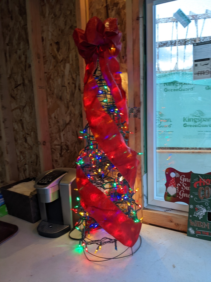 Laura built a Christmas tree out of tomato cages.