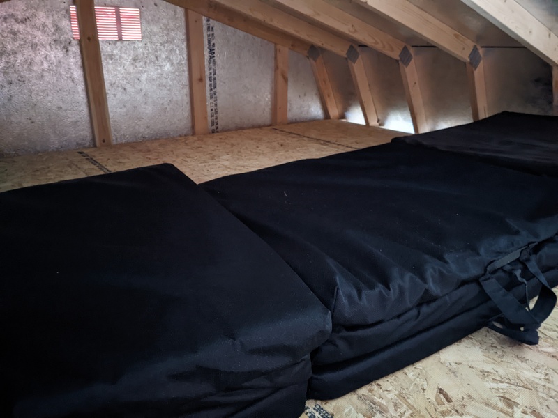 B7 Denmark loft with folding mat storage.