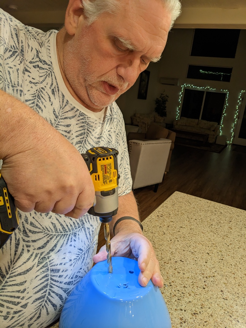 Don making drainage holes.