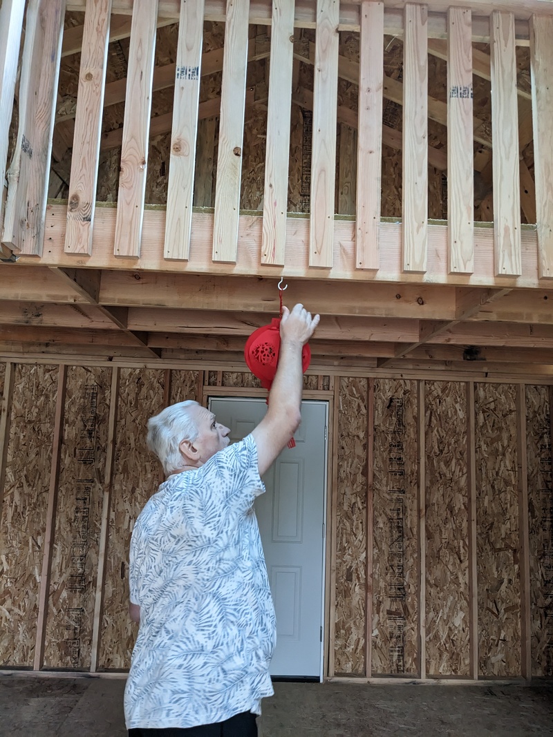 Don hanging up a lantern in B3, Asia.