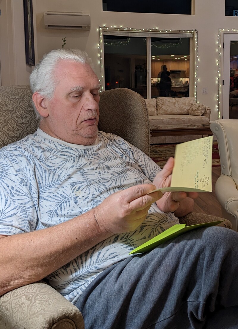 Don enjoys the notes in his birthday card from Joseph's kids.