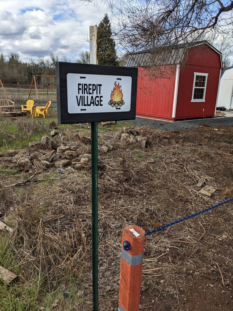 FPV Firepit Village sign #1.