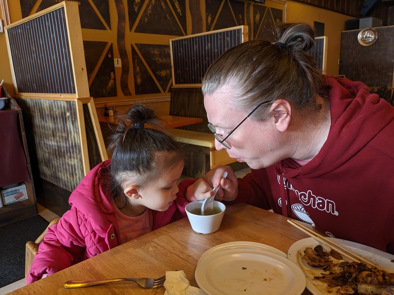 Fei Fei and Ben cool if the soup at the Coburg Mongolian grill.