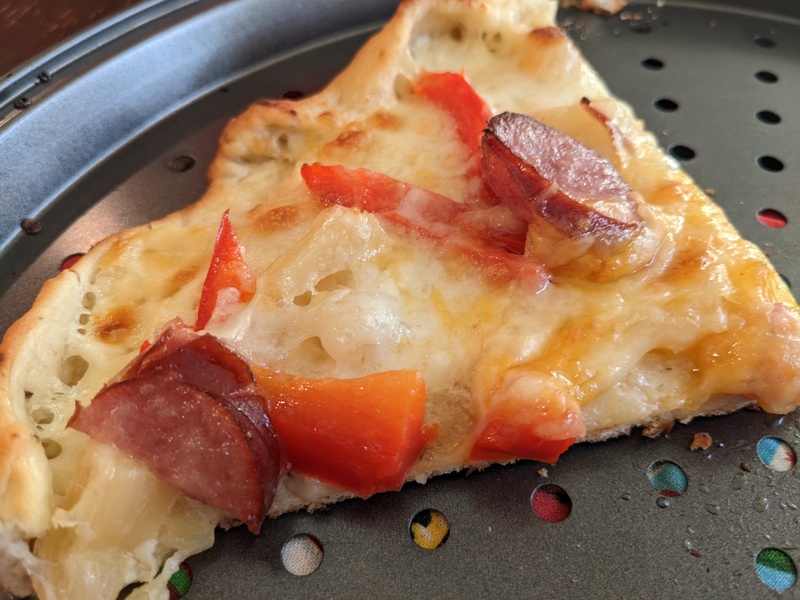 Joseph made us pizza dough and we stretched it and covered it. Yum.