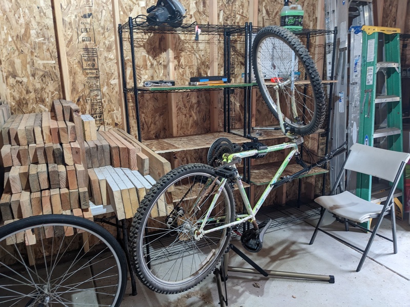 Don bought a bicycle repair stand and set it up in the poison room. I think the room will also turn into a workshop.