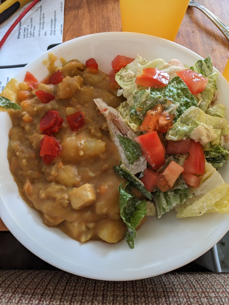 Joseph made us yummy curry for dinner. Tia made the Caesar salad mix with fresh tomatoes if you wanted them.