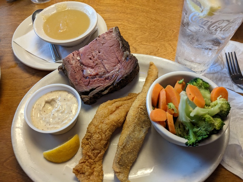 Texas Roadhouse: Lois got half of 16oz Prime Rib, two catfish, apple sauce, vegetables.