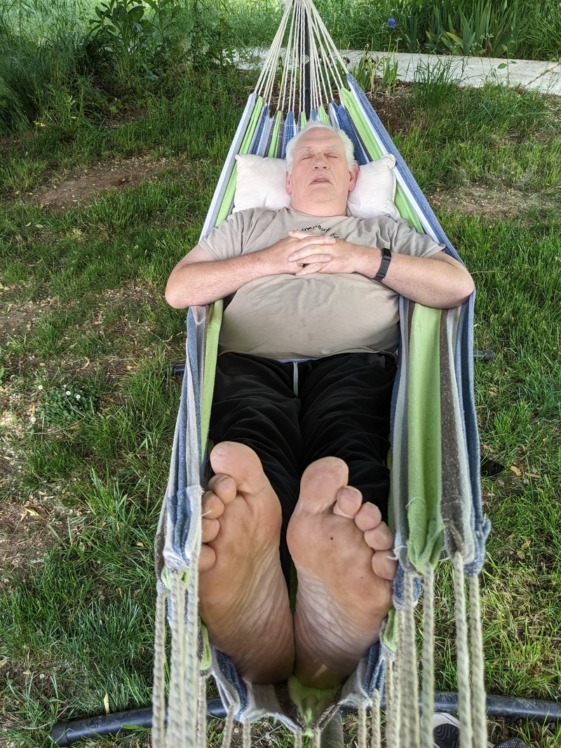 Don rests in a hammock.