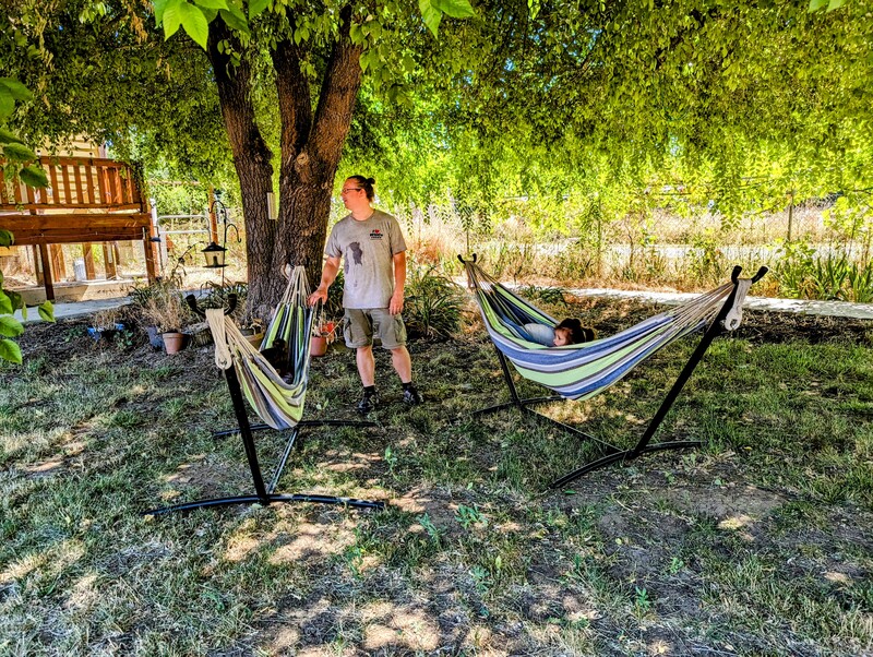 Ben and girls swinging the hammocks