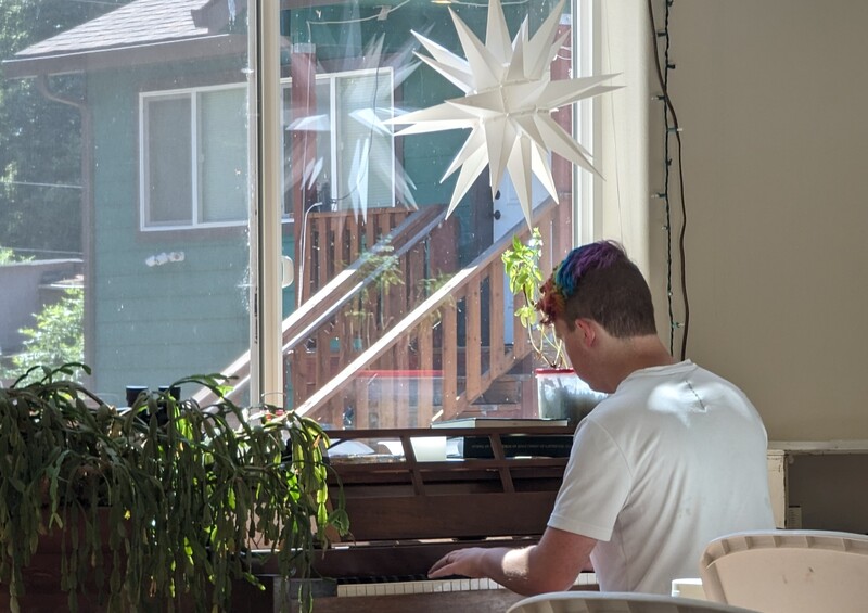 Caleb playing the piano.