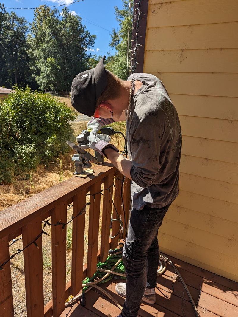 Josiah with the angle grinder.