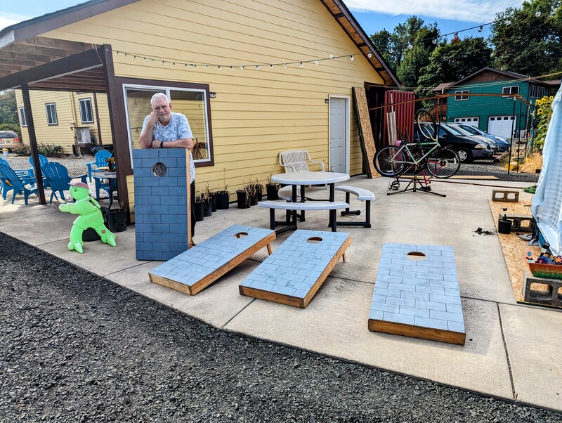 Don put the legs on the cornhole boards.