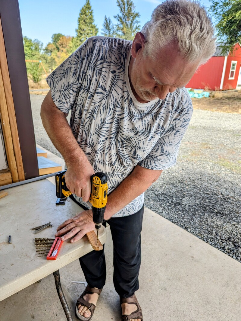 Don making the legs for the cornhole.