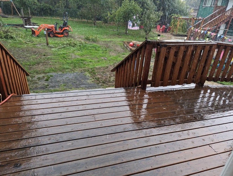 We have had a lot of rain this week.  And we are glad we have our small tractor to help carry the downed tree branches away.