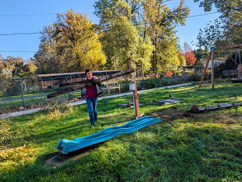 Removing the old play structure debris