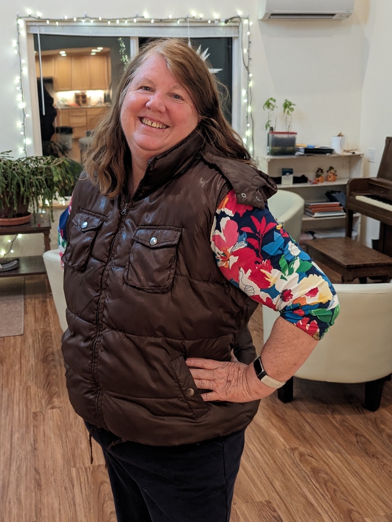 Lois shows off her new cold-weather vest that she got at Goodwill.