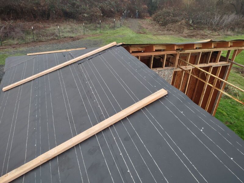 Joseph put up roofing paper.