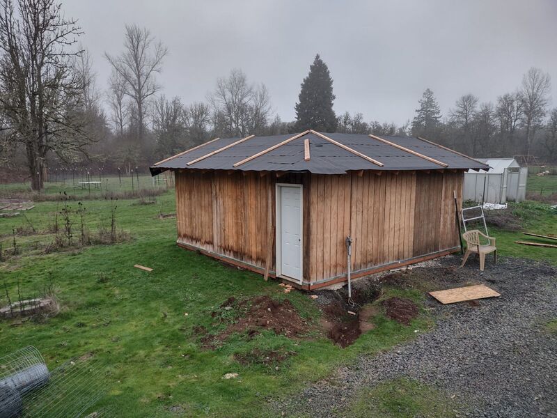 Joseph finished the corner and out up roofing paper .