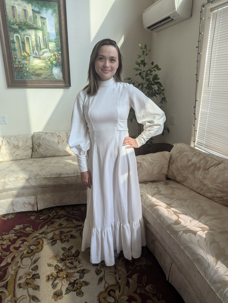 Tia wearing Lois's wedding dress