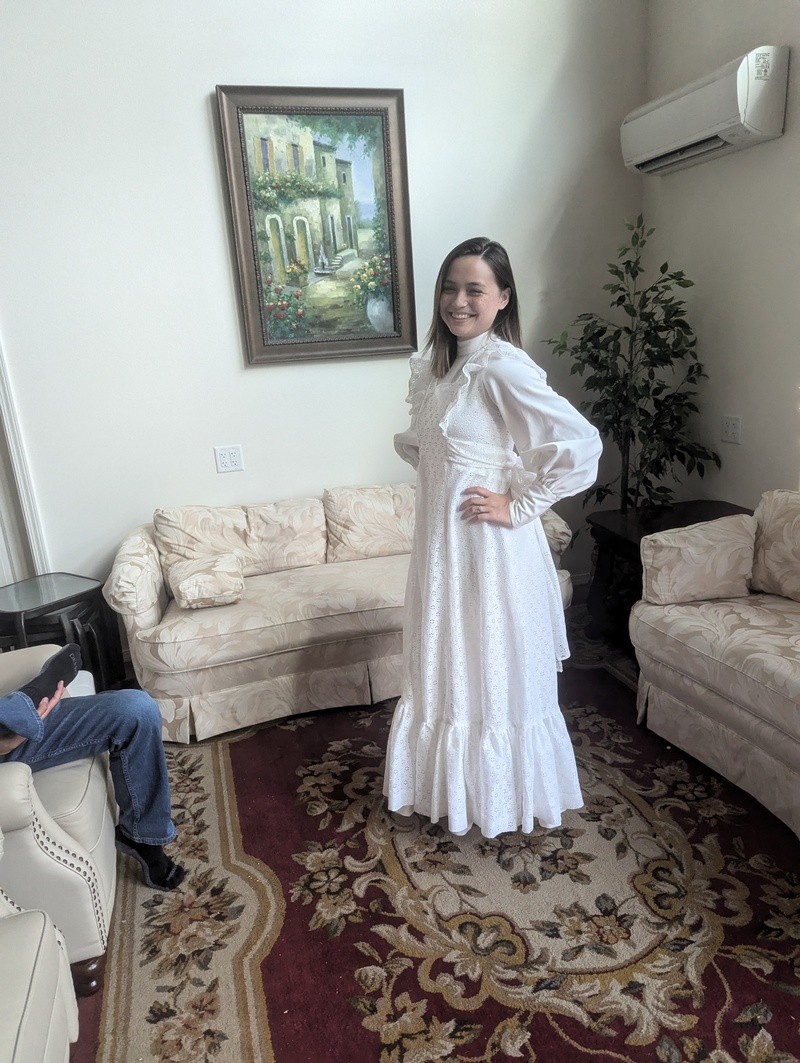 Tia wearing Lois's wedding dress