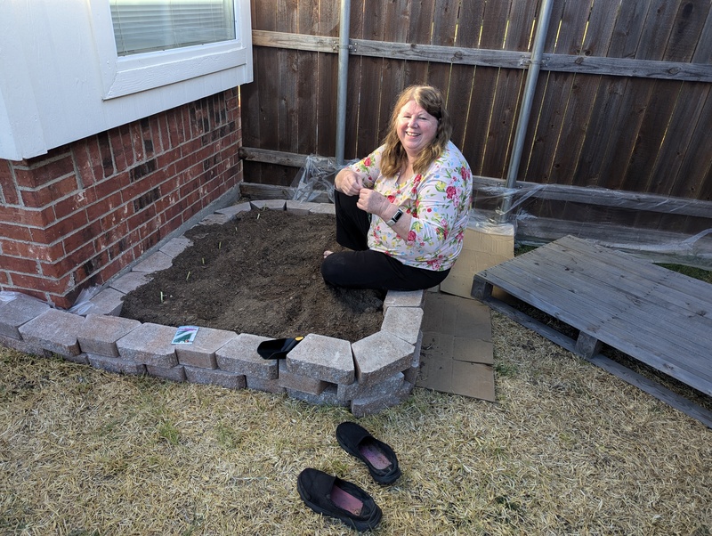 Lois planting chives