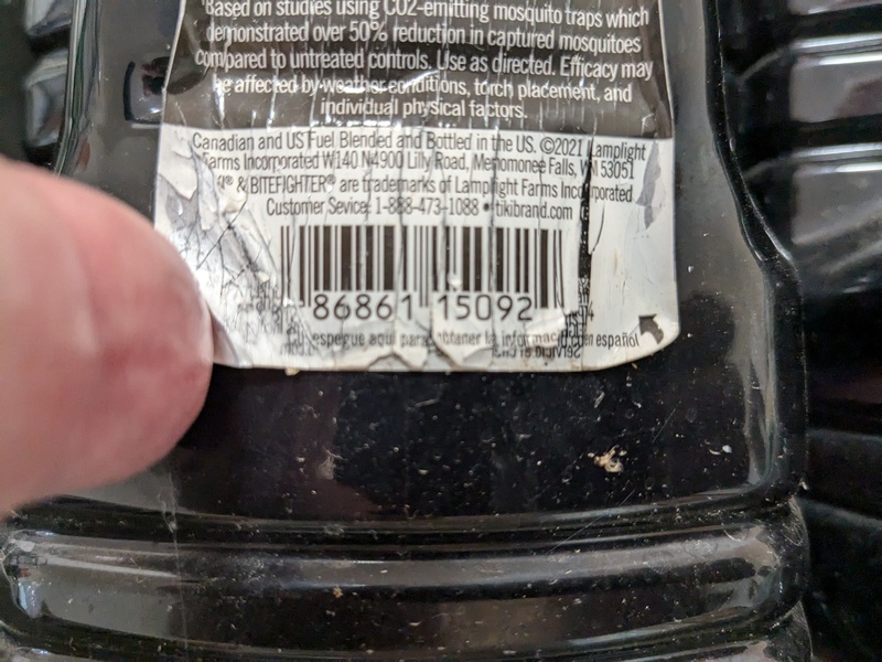 Mystery bottle #2 of "chemicals" left by the previous owner.  The UPC code allowed us to look up what was in the bottle.  It turned out to be Tiki Torch Fuel.