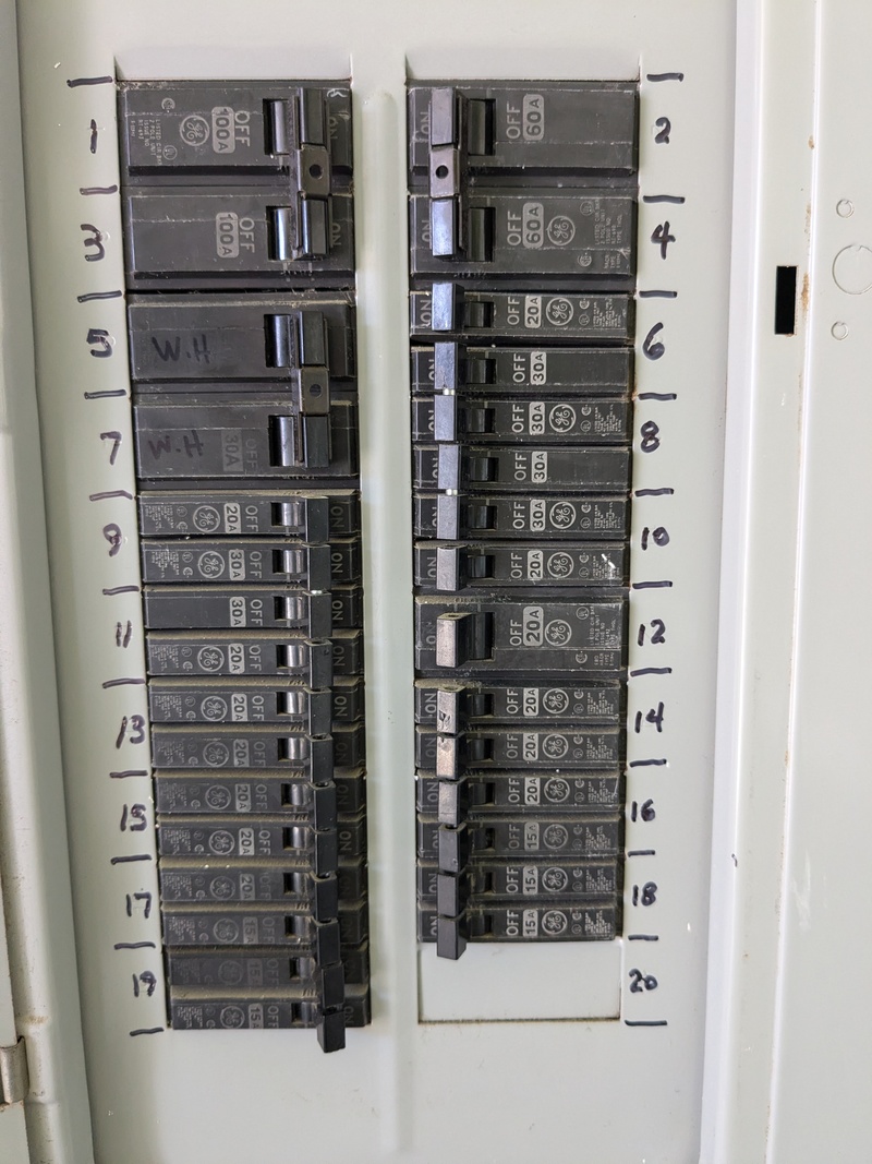 Electrical panel after Don wrote the circuit breaker numbers with a Sharpie.  The original numbers are embossed into the metal but the contrast was too poor for Don to read.