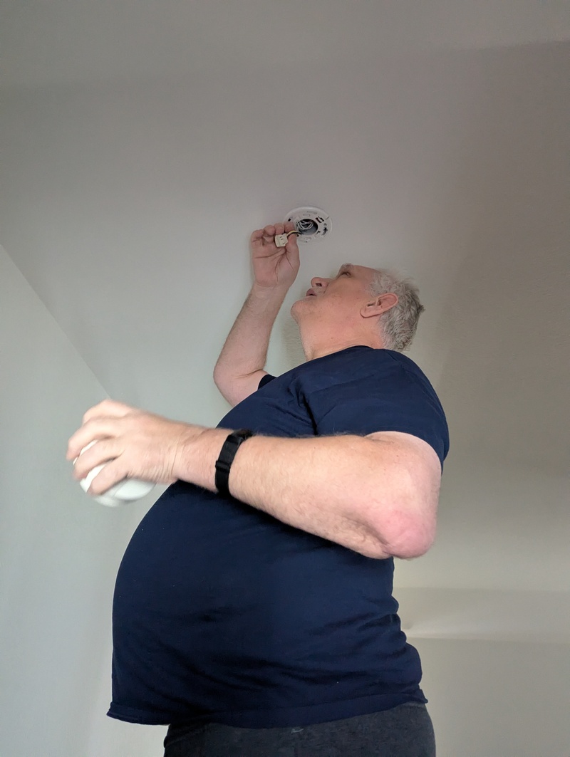 Don is swapping out the old Smoke Alarms.