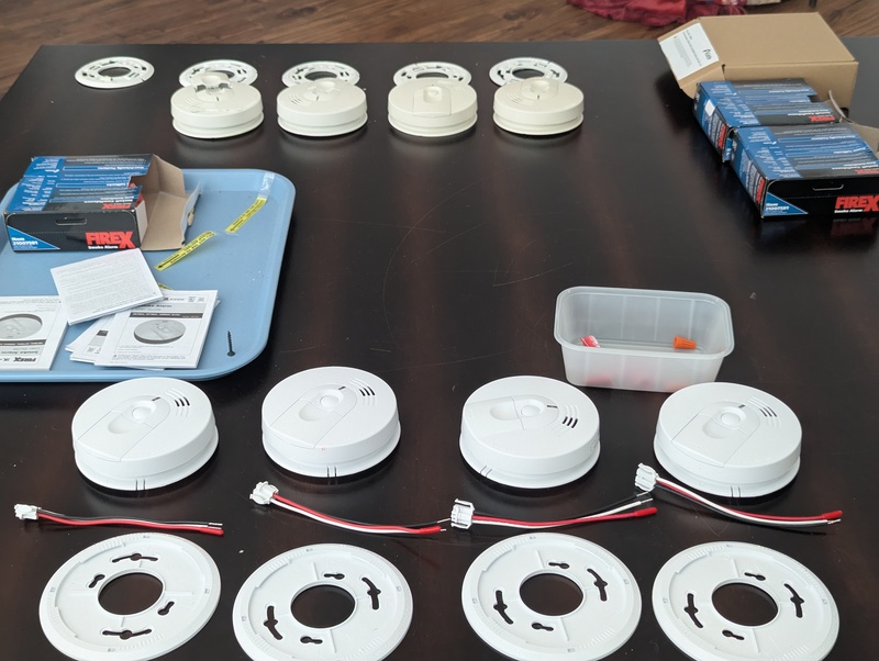 Old smoke alarms and their replacements.