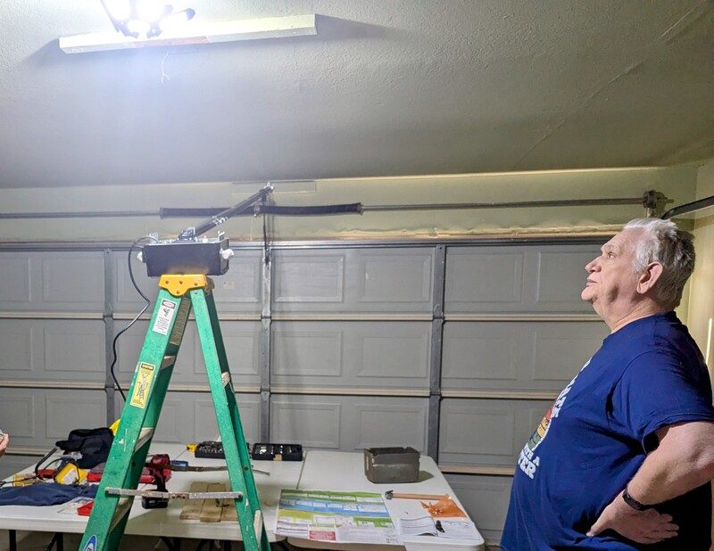 Installing the new garage door opener. Nearly all of the work was done by Tony Solis.