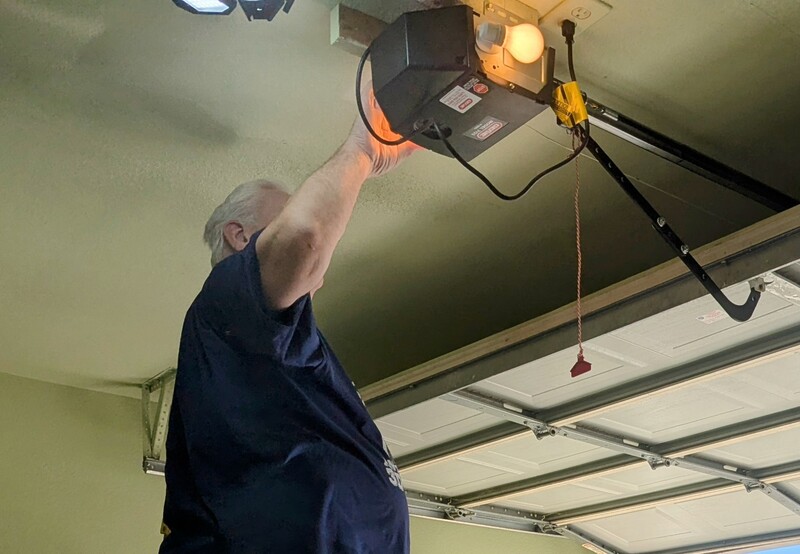 Installing the new garage door opener. Nearly all of the work was done by Tony Solis.