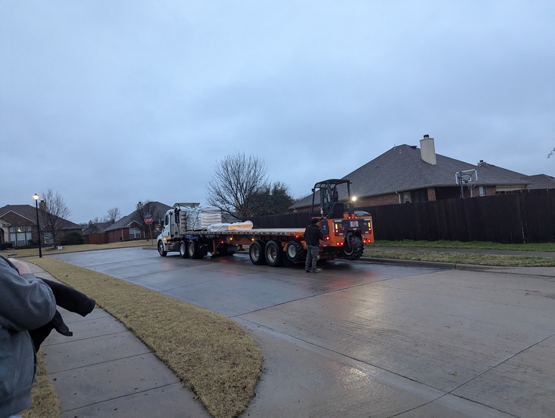 Delivery of almost 100 bags of dirt and bark.