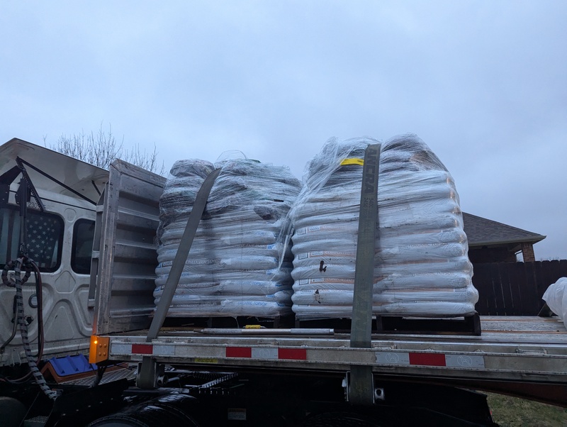 Two pallets of dirt.