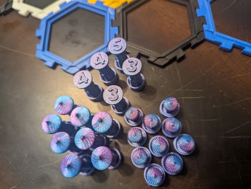 Don 3D printed new Settlers of Catan player pieces that we are calling Super Cities.