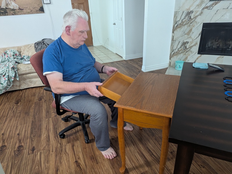 Don works on the drawer of the rescue desk.